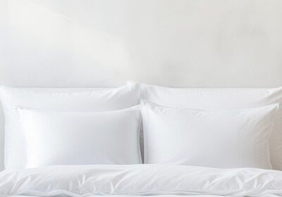 Modern white bed and pillow in the morning ambiance